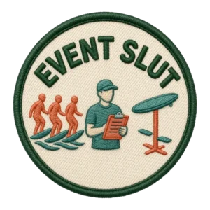 Verdant Ride Event Slut badge: an embroidered patch, a marshal with a clipboard beside riders and a course marker, cream field with a green border.