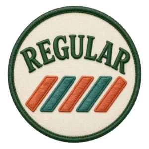 Verdant Ride Regular badge: an embroidered patch, five diagonal tally stripes, cream field with a green border.