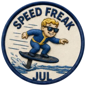Verdant Ride Speed Freak badge for July — embroidered navy-ringed patch showing a rider crouched low on an eFoil with spray and speed lines behind, and JUL on the banner below