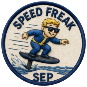 Verdant Ride Speed Freak badge for September — embroidered navy-ringed patch showing a rider crouched low on an eFoil with spray and speed lines behind, and SEP on the banner below